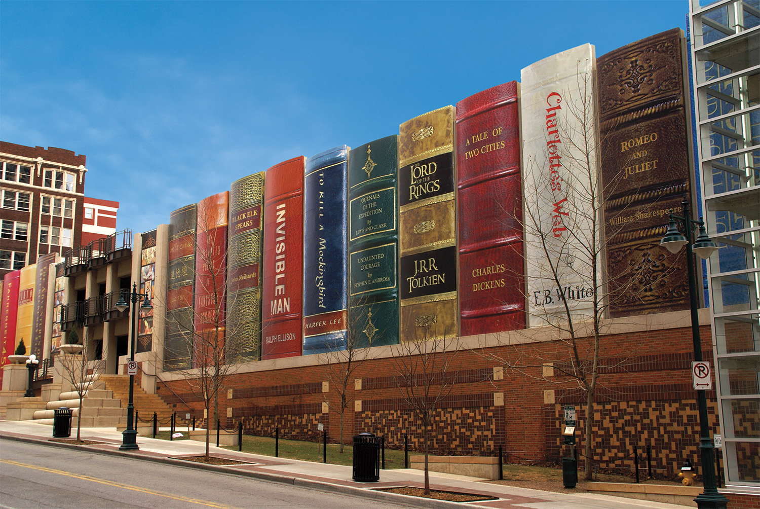 A building high series of book spines (with titles ranging from the Tao Te Ching to Romeo and Juliet) adorns the exterior of the Kansas City Public Library parking garage.