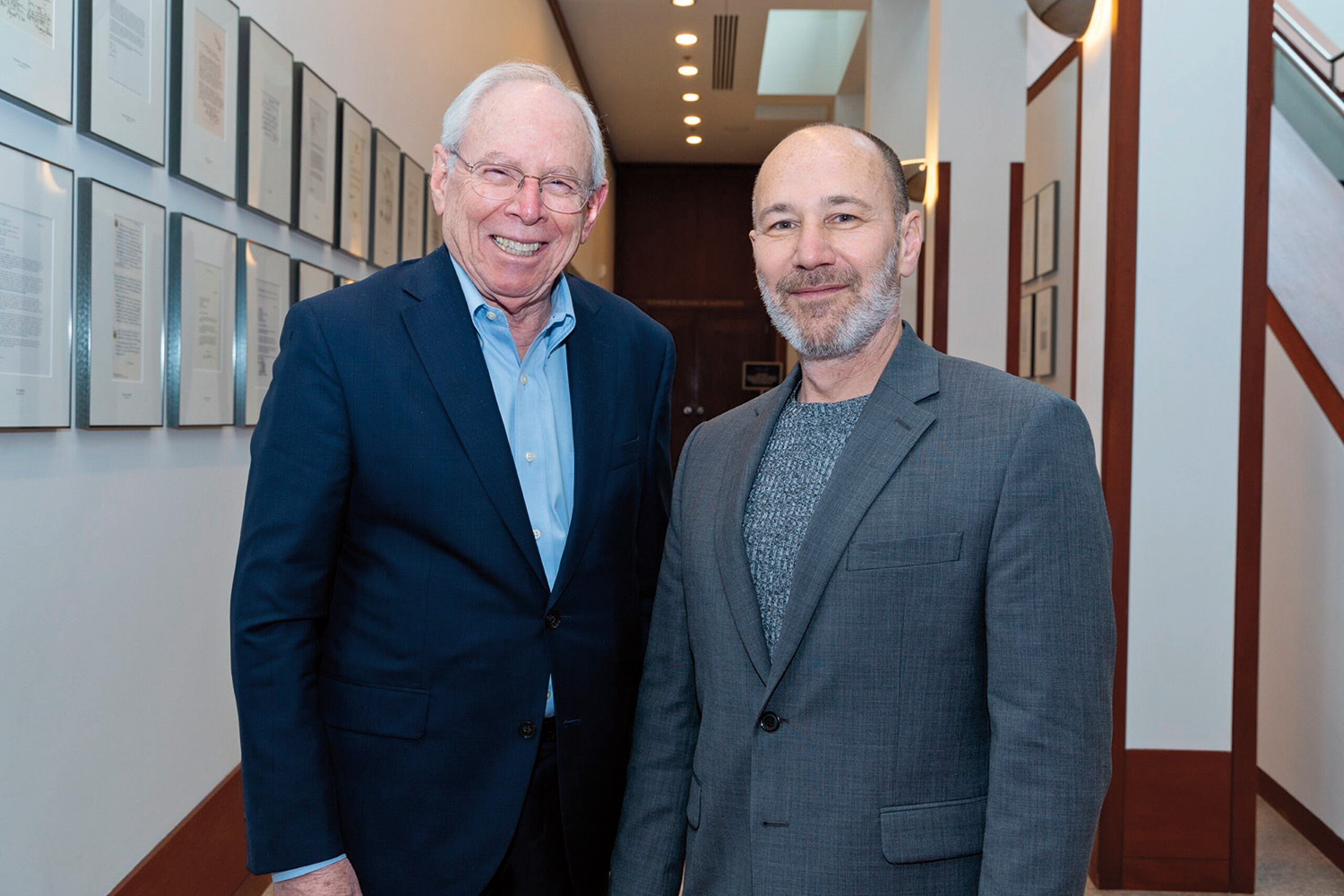 Alan Leshner and Paul Dagan stand together and smile at the viewer.