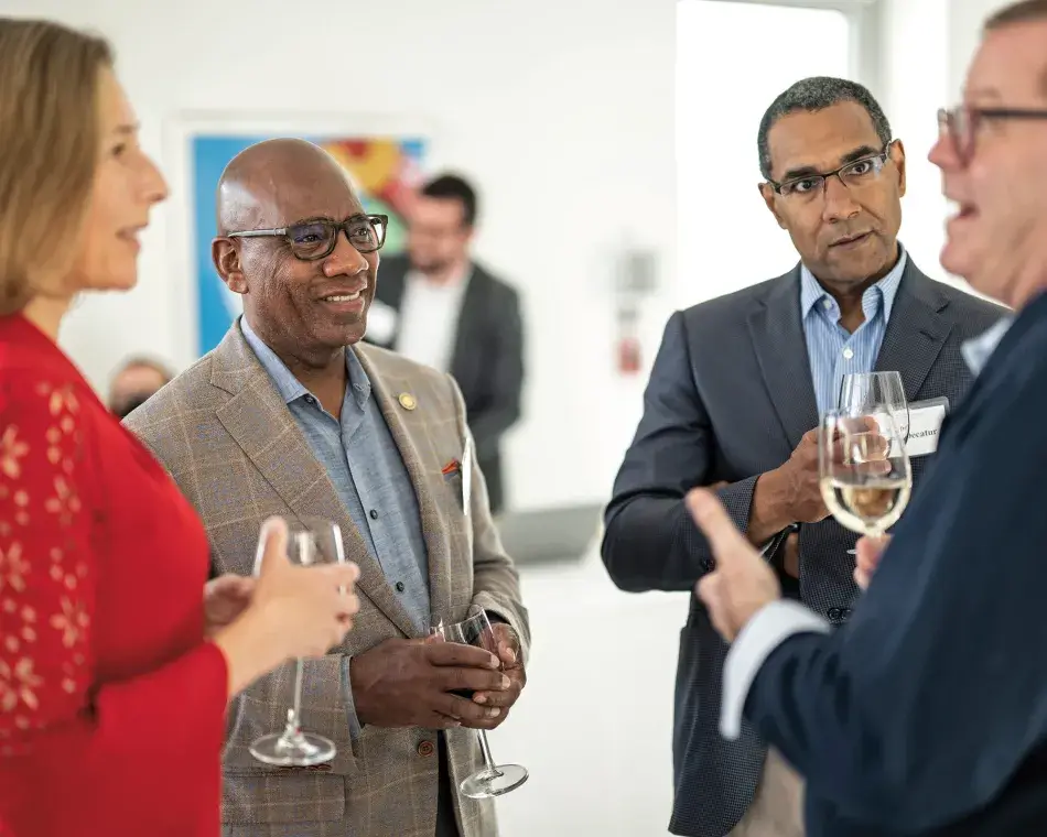 President David Wilson (Morgan State University) and President Sean Decatur (Kenyon College) talk with Provost C. Cybele Raver (Vanderbilt University) and Dr. Seth Pollak (University  of Wisconsin–Madison). Daniel Bayer Photography