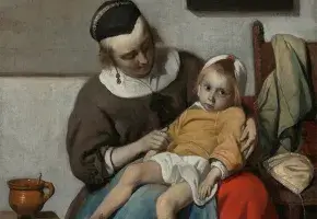 A portrait of an ill child sitting on a caregiver’s lap, slouching to the point of practically lying down. The caregiver looks to the child. The child looks toward the viewer.